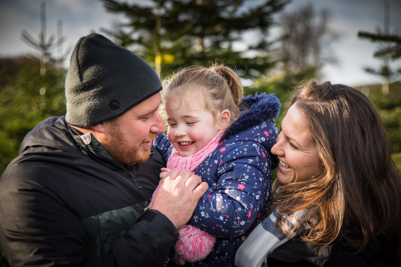 Family enjoying Cut your Own Christmas Tree